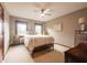 Serene bedroom featuring natural light from a window, complemented by tasteful furnishings and decor at 7984 S Deer Lake Dr, Nineveh, IN 46164