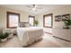 Bright bedroom with hardwood floors and a view of the outside at 7984 S Deer Lake Dr, Nineveh, IN 46164