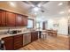 Beautiful kitchen with granite counters, stainless appliances, ceiling fan, and wood flooring at 7984 S Deer Lake Dr, Nineveh, IN 46164