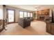 Cozy living room features a brick fireplace, comfortable sofas, and large windows at 7984 S Deer Lake Dr, Nineveh, IN 46164