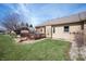 Private backyard featuring a wooden deck and well-maintained lawn and landscape at 946 Peppermill Run, Greenwood, IN 46143