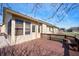 Spacious wooden deck perfect for outdoor seating with a view of the well-kept backyard at 946 Peppermill Run, Greenwood, IN 46143