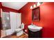 Cozy bathroom featuring a tub/shower combo and a single sink vanity at 946 Peppermill Run, Greenwood, IN 46143