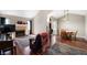 Inviting living area with a fireplace, hardwood floors, and comfortable seating, perfect for relaxing at 946 Peppermill Run, Greenwood, IN 46143