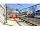 View of a back deck with two chairs and pergola, perfect for enjoying time outside at 952 E 34Th St, Indianapolis, IN 46205