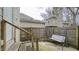 Enclosed backyard with a swing and a wooden fence for privacy at 952 E 34Th St, Indianapolis, IN 46205