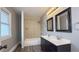This bathroom has an updated vanity with double sinks and a shower-tub combination perfect for a Gathering at 952 E 34Th St, Indianapolis, IN 46205