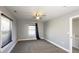 Bedroom with ceiling fan, carpet flooring and window with natural light at 952 E 34Th St, Indianapolis, IN 46205