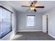 This bedroom features a ceiling fan and two windows to let in natural light and is ready for your personal touches at 952 E 34Th St, Indianapolis, IN 46205