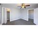 This bedroom is spacious and has 2 closets for plenty of storage and a ceiling fan for year round comfort at 952 E 34Th St, Indianapolis, IN 46205