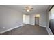 Bedroom offers plush carpet, natural light, and neutral color palette at 952 E 34Th St, Indianapolis, IN 46205