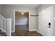 Entryway showcases hardwood floors and a view into the bright living room at 952 E 34Th St, Indianapolis, IN 46205