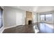 Living room boasts wood flooring, a brick fireplace, and abundant natural light at 952 E 34Th St, Indianapolis, IN 46205