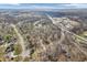 Aerial view of neighborhood and commercial area with a highway running through it at 108 Parkridge Dr, Danville, IN 46122