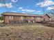 Rustic home exterior with siding, brick accents, and a wooden deck on a spacious lot at 108 Parkridge Dr, Danville, IN 46122