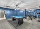 Finished basement featuring a pool table, a variety of workout equipment and stairs at 108 Parkridge Dr, Danville, IN 46122