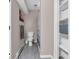 Bathroom featuring a toilet, towel rack, and large shelf at 108 Parkridge Dr, Danville, IN 46122