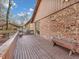 Spacious wooden deck featuring bench seating, perfect for outdoor relaxation and enjoying the surrounding views at 108 Parkridge Dr, Danville, IN 46122