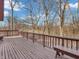 Expansive wooden deck offering ample space for outdoor seating and panoramic views of the surrounding landscape at 108 Parkridge Dr, Danville, IN 46122