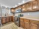 Bright kitchen with wood cabinets, stainless steel appliances, and recessed lighting at 108 Parkridge Dr, Danville, IN 46122