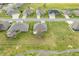 A wide aerial perspective of brick homes and green lawns, providing a glimpse into community living at 1120 Constitution Dr, Edinburgh, IN 46124