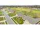 A beautiful aerial view of homes lining a street next to a golf course at 1120 Constitution Dr, Edinburgh, IN 46124