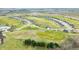 Aerial view of a residential neighborhood integrated with a golf course, promoting a serene and active lifestyle at 1120 Constitution Dr, Edinburgh, IN 46124