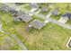 Aerial view of brick homes with green lawns, sidewalks, and streets in a residential neighborhood at 1120 Constitution Dr, Edinburgh, IN 46124