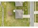 Overhead view of a home featuring a well-maintained lawn and roof, blending into a peaceful neighborhood setting at 1120 Constitution Dr, Edinburgh, IN 46124