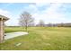 View of the backyard and surrounding community on a bright sunny day at 1120 Constitution Dr, Edinburgh, IN 46124