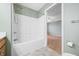 Bathroom showing the shower and tub with tile flooring and view of the bedroom at 1120 Constitution Dr, Edinburgh, IN 46124