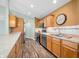 Bright kitchen features stainless steel appliances, wood flooring, and plenty of cabinet space at 1120 Constitution Dr, Edinburgh, IN 46124