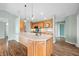 Spacious kitchen island with bar seating and pendant lights, open to the living area at 1120 Constitution Dr, Edinburgh, IN 46124