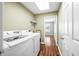 Well-lit laundry room features modern appliances and a convenient layout at 1120 Constitution Dr, Edinburgh, IN 46124