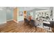 Bright living room featuring an open floor plan with breakfast bar and view to the dining room at 1120 Constitution Dr, Edinburgh, IN 46124