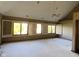 Bonus room with a fan and large windows offering plenty of natural light and views at 11967 Windpointe Pass, Carmel, IN 46033