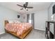 Cozy bedroom with neutral walls, wood frame bed, and ceiling fan at 1283 Cliff View Dr, Westfield, IN 46074