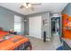 Nice carpeted bedroom with ceiling fan, natural light, and closet with sliding doors at 1283 Cliff View Dr, Westfield, IN 46074