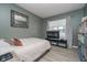 Cozy bedroom featuring a TV, books, neutral colors, and natural light at 1283 Cliff View Dr, Westfield, IN 46074