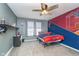 The large bedroom has a ceiling fan and sports-themed decor at 1283 Cliff View Dr, Westfield, IN 46074