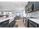 Bright kitchen features stainless appliances, subway tile backsplash, and a farmhouse sink at 1283 Cliff View Dr, Westfield, IN 46074