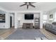 Cozy living room with modern furnishings, a fireplace, and great natural light at 1283 Cliff View Dr, Westfield, IN 46074