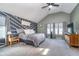 Spacious main bedroom with a unique accent wall, large windows, and neutral tones at 1283 Cliff View Dr, Westfield, IN 46074