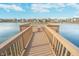 Scenic view of a wooden pier extending into a calm lake, offering a serene and picturesque setting at 1283 Cliff View Dr, Westfield, IN 46074