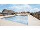 Inviting community pool surrounded by well-maintained grounds and a protective fence for safety at 1283 Cliff View Dr, Westfield, IN 46074