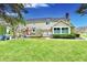 Backyard with patio area, outdoor furniture, built in grill and ample space for outdoor entertainment at 12917 Brighton Ln, Carmel, IN 46032