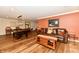 Large finished basement with pool table, seating area, and stylish decor for relaxation at 12917 Brighton Ln, Carmel, IN 46032