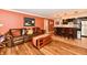 Finished basement features a comfortable seating area with bar and kitchen area at 12917 Brighton Ln, Carmel, IN 46032