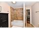 Clean bathroom includes a shower over tub and a door to a secondary room at 12917 Brighton Ln, Carmel, IN 46032