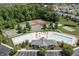 An aerial photo of the community clubhouse with pool, tennis, and basketball courts at 12959 Balfour Rd, Fishers, IN 46037